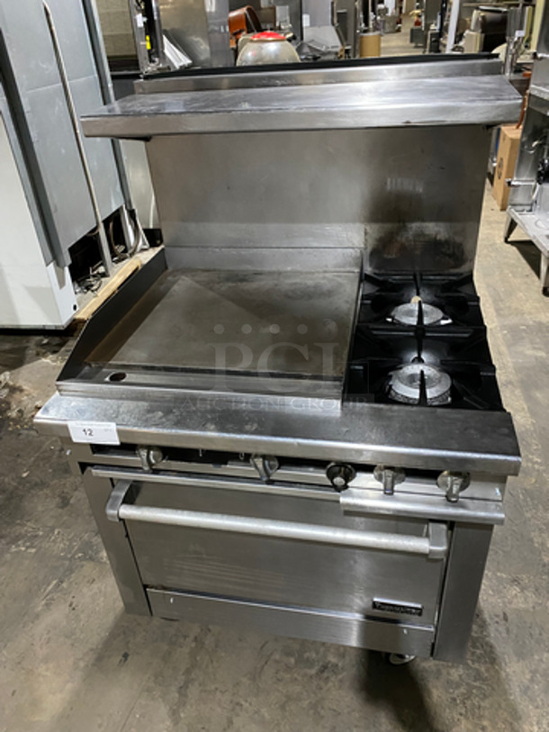 FAB! Therma Tek Commercial Natural Gas Powered Flat Top Griddle! With Right Side 2 Burners! Griddle Has Side Splashes! With Backsplash And Salamander Shelf! With Oven Underneath! Metal Oven Rack! All Stainless Steel! On Casters!