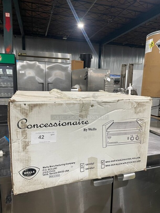 BRAND NEW IN BOX! Wells Commercial Hot Dog Roller! With Stainless Steel Rollers! 120V! Model: 4007405! - Image 1 of 2