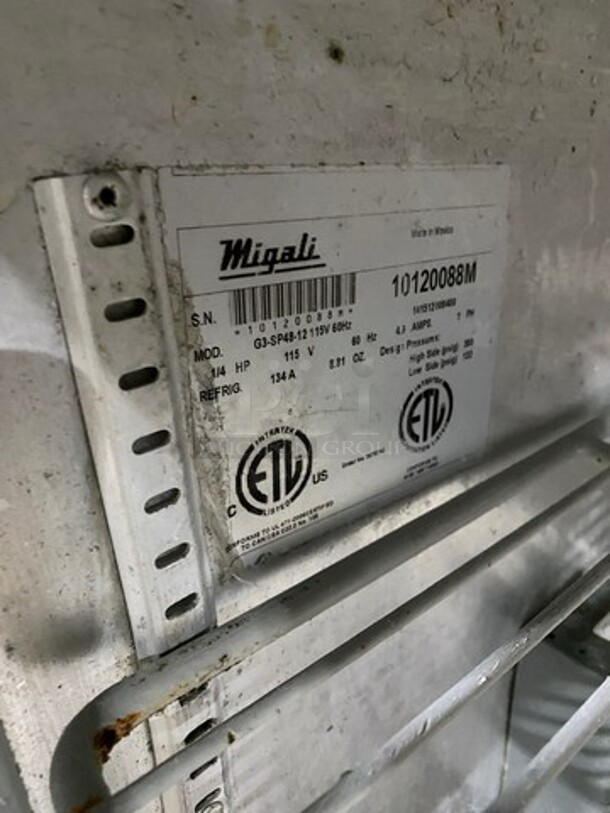 Migali Commercial Refrigerated Mega Top Sandwich Prep Table! With 2 Door Storage Space Underneath! Poly Coated Racks! All Stainless Steel! On Casters! Model: G3SP4812 SN: 10120088M 115V 60HZ 1 Phase - Image 6 of 9