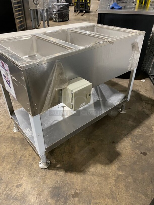 NEW! NEVER USED! Duke Commercial Electric Powered 3 Well Steam Table! With Storage Space Underneath! With Commercial Cutting Board! All Stainless Steel! On Casters! Model: E303M SN: 03041770! 208V 3 Phase! - Image 4 of 9