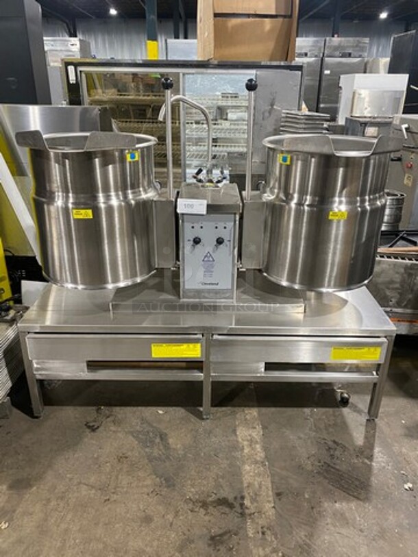 LIKE NEW! Cleveland Commercial Electric Powered Jacketed Tilting Soup Kettle! On Equipment Stand! All Stainless Steel! On Legs! WORKING WHEN REMOVED! Model: TKET12T SN: 111123050377A, 111123050377B! 240V 60HZ 3 Phase! - Image 1 of 12