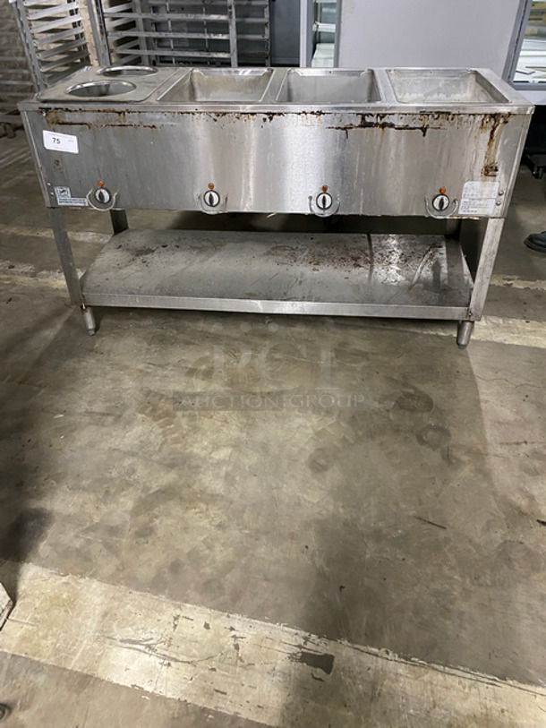 Duke 4 Well Steam Table! With Round Pan Adapter! With Storage Shelf Underneath! All Stainless Steel! On Legs! Model: E304M SN: 02140121 240V 60HZ 1 Phase