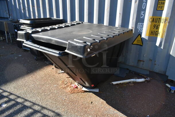 BRAND NEW SCRATCH AND DENT! Rubbermaid Black Poly Bin w/ Lid on Commercial Casters.  - Image 1 of 4