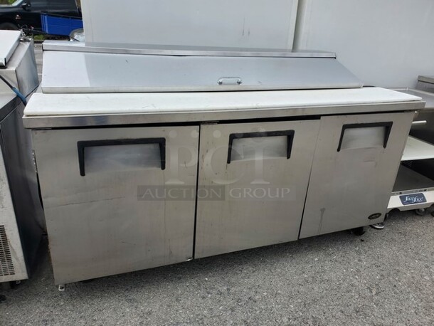 TRUE TSSU-72-18 3-door 72" Refrigerated Sandwich/Prep Table 

72X30X36 On  Caster, Tested and working! SOLD AS IS - Image 1 of 3