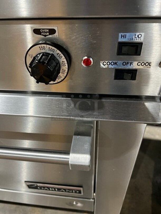 WOW! NEW OUT OF THE BOX! NEVER USED! Garland Heavy Duty Commercial Electric Powered 6 Burner Range With Full Size Convection Oven Underneath! All Stainless Steel Body! With Oven Racks! Model 36ER33 - Image 8 of 9