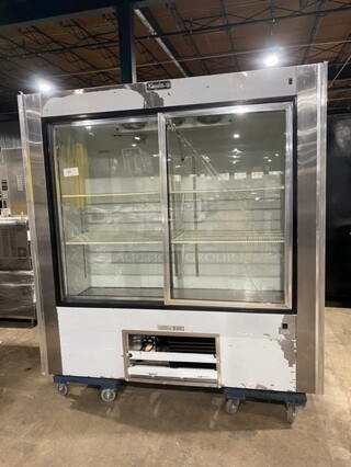 Leader 2010 Commercial Refrigerator Merchandiser! With 2 Sliding Glass Doors! With Poly Coated Racks! One Glass Door Is Broken! Model LS72 Serial PT010816! 115V 1Phase!