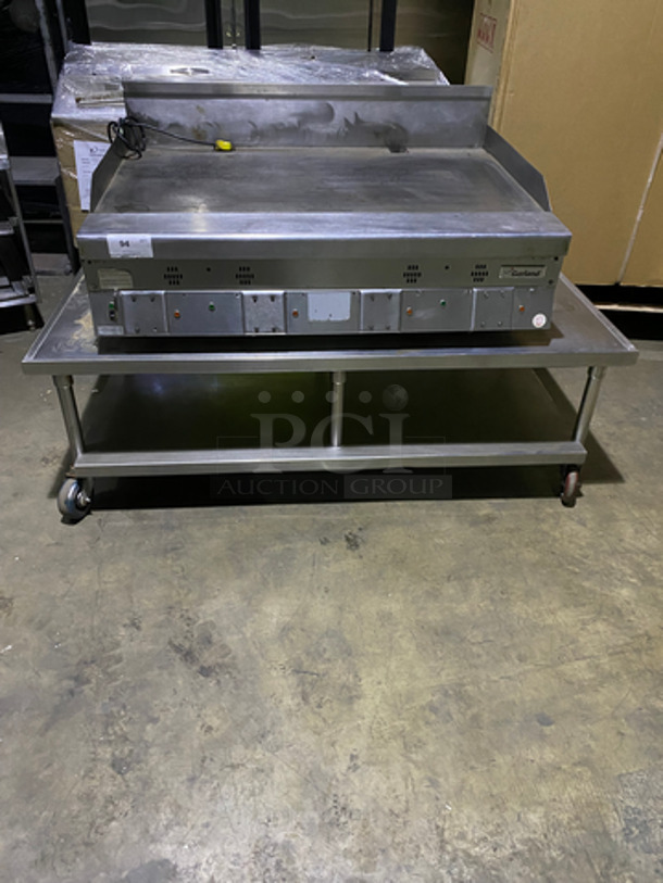 MUST HAVE! Garland Commercial Countertop Natural Gas Powered Heavy Duty Plancha Flat Grill! With Back And Side Splashes! On Heavy-Duty Stainless-Steel Equipment Stand! With Underneath Storage Space! On Casters!