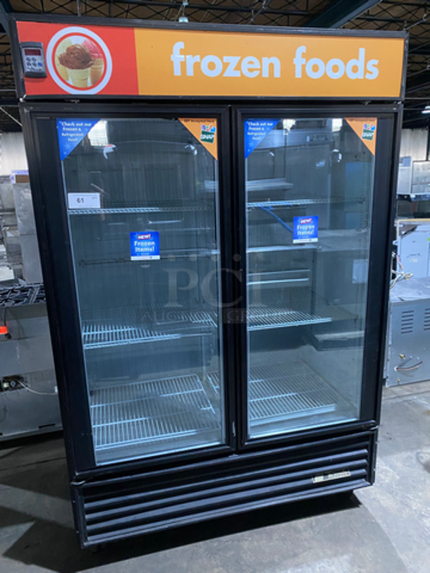 COOL! True 2 Door Reach In Freezer Merchandiser! With View Through Doors! With Poly Coated Racks! On Casters! Model: GDM49F SN: 14775740 115/208/230V 60HZ 1 Phase