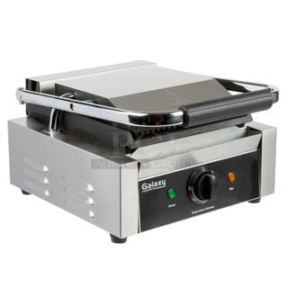 BRAND NEW SCRATCH AND DENT! 2023 Galaxy 177P65SG Stainless Steel Commercial Countertop Single Panini Sandwich Grill with Grooved Top and Smooth Bottom Plates - 8 1/2" x 8 1/2" Cooking Surface. 120 Volts, 1 Phase. Tested and Working!
