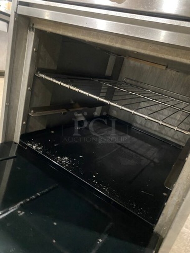 Commercial Natural Gas Powered 4 Burner Stove! With Raised Back Splash! With Oven Underneath! Stainless Steel Body! On Casters! - Image 8 of 10