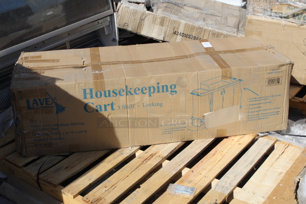 BRAND NEW SCRATCH & DENT! Lavex 274HKCARTLCK  Hotel / Housekeeping Cart - Large Locking Three Shelf. Box is damaged, handle on cart is damaged.   - Image 3 of 5