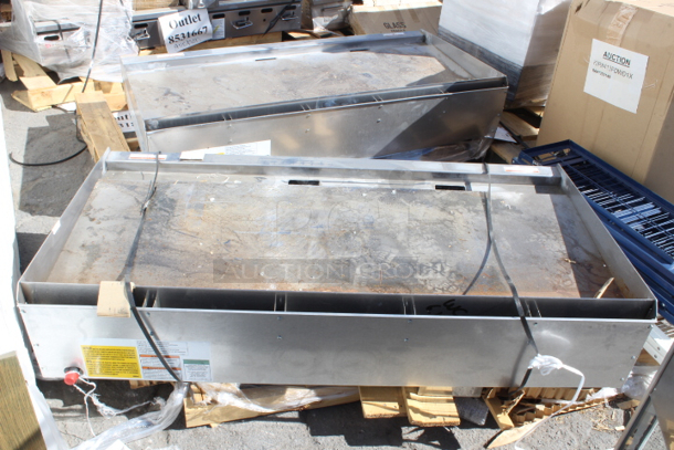 BRAND NEW SCRATCH & DENT! Wolf by Vulcan AGM60-NAT Natural Gas 60" Heavy-Duty Gas Countertop Griddle with Manual Controls - 135,000 BTU. Unit has surface rust and very minor denting.  - Image 2 of 4