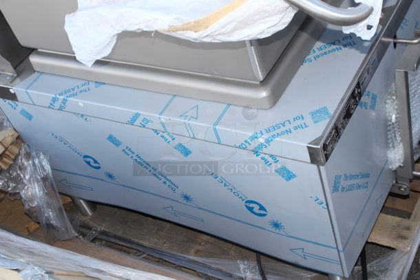 BRAND NEW SCRATCH & DENT!! Vulcan VG40-NAT Natural Gas 40 Gallon Manual Tilt Braising Pan / Tilt Skillet - 120,000 BTU. Factory Wrapping, Attachments in Pan, Dent at bottom front right leg, slight dent on side panel.  - Image 6 of 6
