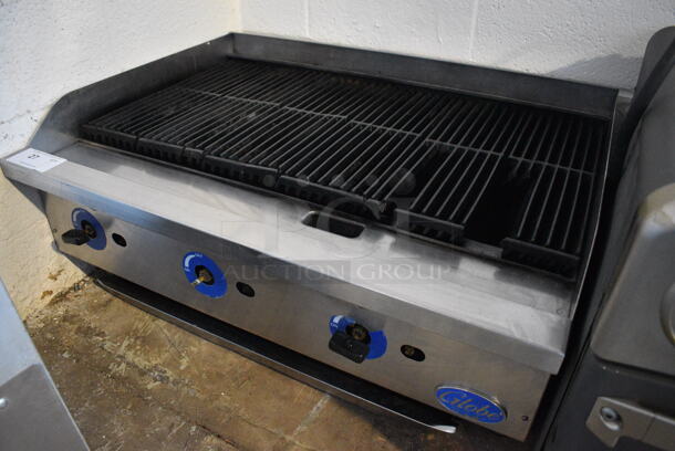 Globe Stainless Steel Commercial Countertop Gas Powered Charbroiler Grill. 36x27x15.5
