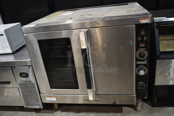 Hobart Stainless Steel Commercial Full Size Convection Oven w/ View Through Door, Solid Door, Metal Oven Racks and Thermostatic Controls. 