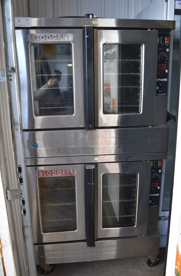2 Blodgett Zephaire Stainless Steel Commercial Natural Gas Powered Full Size Convection Oven w/ View Through Doors, Metal Oven Racks and Thermostatic Controls on Commercial Casters. 2 Times Your Bid!