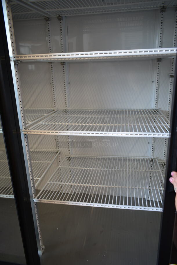 BRAND NEW SCRATCH AND DENT! 2023 True GDM-69-HC-LD Metal Commercial 3 Door Reach In Cooler Merchandiser w/ Poly Coated Racks. 115 Volts, 1 Phase. Tested and Working! - Image 4 of 7