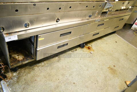 Delfield Stainless Steel Commercial 6 Drawer Chef Base on Commercial Casters. This Unit Was In Working Condition When the Restaurant Closed. (kitchen)