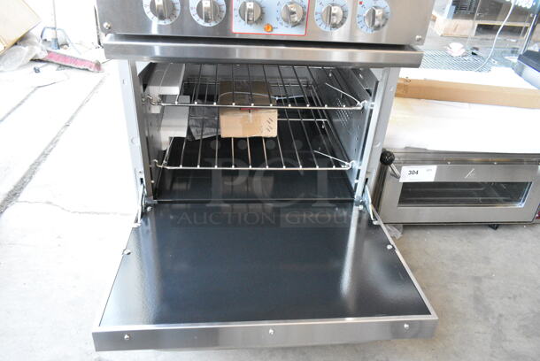 BRAND NEW SCRATCH AND DENT! Cooking Performance Group CPG 351ER24SC Stainless Steel Commercial 24" 4-Burner Electric Range with Space Saver Oven. 208 Volts, 3 Phase. - Image 4 of 10