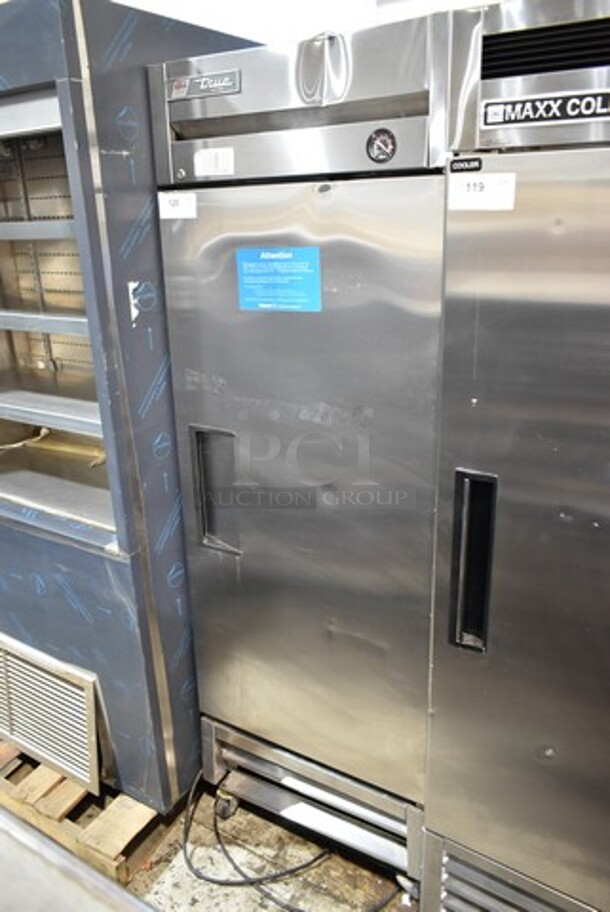 2017 True T-19F Stainless Steel Commercial Single Door Reach In Cooler on Commercial Casters. Back Right Caster is Broken and Back Left Caster Is Missing. 115 Volts, 1 Phase. Tested and Working! - Image 1 of 4