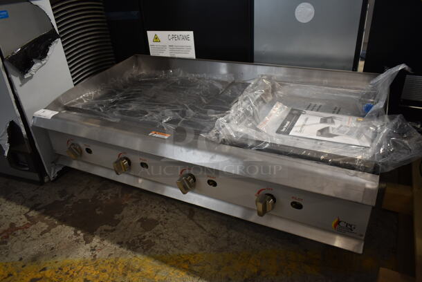 BRAND NEW SCRATCH AND DENT! 2022 Cooking Performance Group 351GMCPG48NL Stainless Steel Commercial Countertop Natural Gas Powered Flat Top Griddle. 120,000 BTU.  - Image 1 of 7