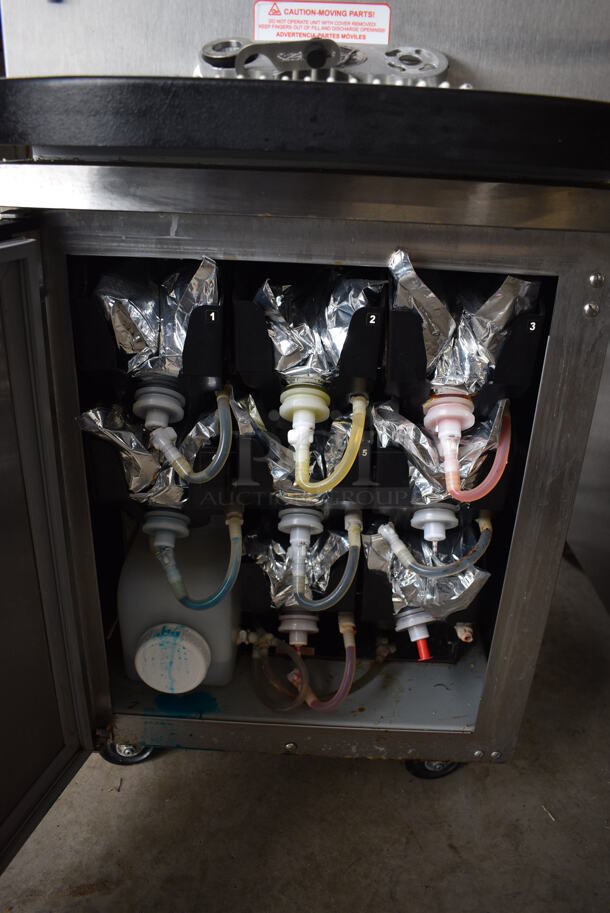 2017 Taylor Model C709-27 Stainless Steel Commercial Air Cooled Single Flavor Soft Serve Ice Cream Machine w/ Taylor Model C20100-WFB 10 Head Flavor Blast and Color Touch Panel for Flavor Burst on Commercial Casters. 208-230 Volts, 1 Phase. 23x33x61 - Image 11 of 11