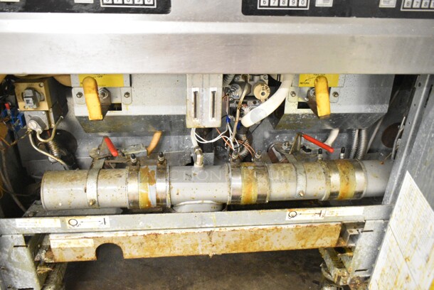 Frymaster FMP345EBLSC Stainless Steel Commercial Natural Gas Powered 3 Bay Deep Fat Fryer w/ Right Side Dumping Station on Commercial Casters. 122,000 BTU.  - Image 9 of 12