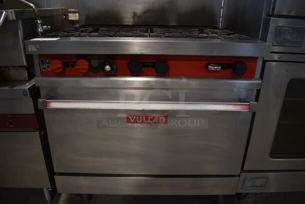 Vulcan 36L-574 Stainless Steel Commercial Natural Gas Powered 6 Burner Range w/ Oven, Over Shelf and Back Splash on Commercial Casters. 36x31x61 - Image 4 of 9