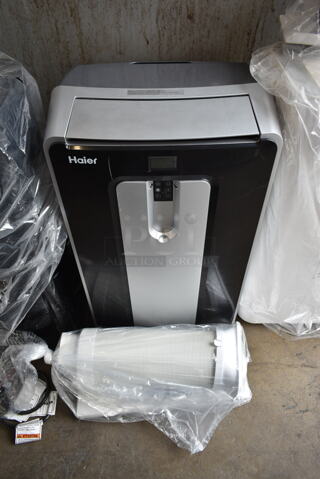 BRAND NEW SCRATCH AND DENT! Haier HPN12XHM 12,000 BTU Portable Air Conditioner Heater Dehumidifier. 115 Volts, 1 Phase. Tested and Working!