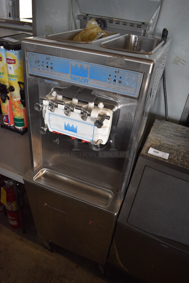 Taylor Model 794-33 Stainless Steel Commercial Water Cooled Floor Style 2 Flavor w/ Twist Soft Serve Ice Cream Machine on Commercial Casters. 208-230 Volts, 3 Phase. 20x34x59 - Image 2 of 7