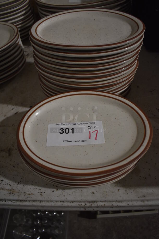 17 White Ceramic Oval Plates w/ Brown Lines on Rim. 9.5x7.5x1. 17 Times Your Bid! - Image 1 of 3
