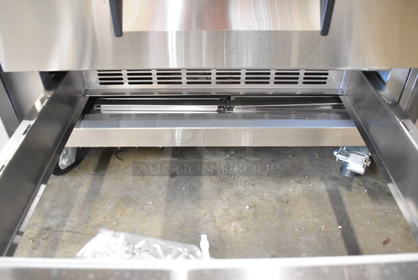 BRAND NEW SCRATCH AND DENT! 2023 Avantco 178CBE84HC Stainless Steel Commercial 4 Drawer Refrigerated Chef Base on Commercial Casters. 115 Volts, 1 Phase. Tested and Working! - Image 4 of 8