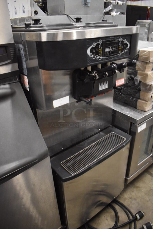 Taylor C713-33 Stainless Steel Commercial Floor Style Air Cooled 2 Flavor w/ Twist Soft Serve Ice Cream Machine on Commercial Casters. 208-230 Volts, 3 Phase. 25x38x60 - Image 2 of 9