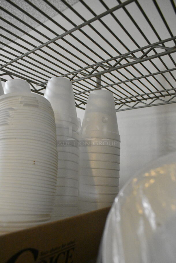Chrome Finish 5 Tier Wire Shelving Unit w/ Contents Including Cups, Plasticware. BUYER MUST DISMANTLE. PCI CANNOT DISMANTLE FOR SHIPPING. PLEASE CONSIDER FREIGHT CHARGES. (secondary dining room) - Image 3 of 12