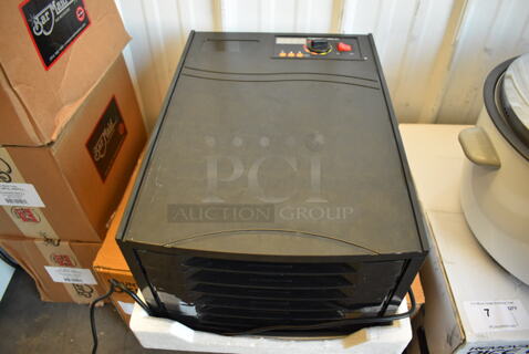 LIKE NEW! Backyard Pro Butcher Series Countertop Electric Powered 6 Tray Food Dehydrator with 40 Hour Timer. Used a Few Times at Trade Show as a Demonstration. 120 Volts, 1 Phase. 13x18.5x9.5. Tested and Working!