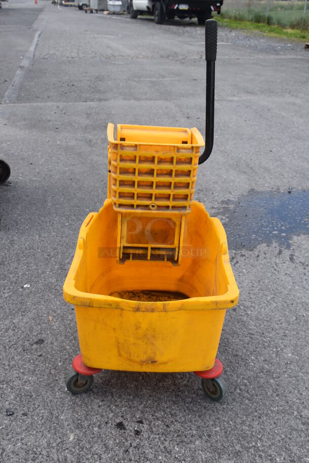 Yellow Poly Mop Bucket w/ Wringing Attachment on Commercial Casters.