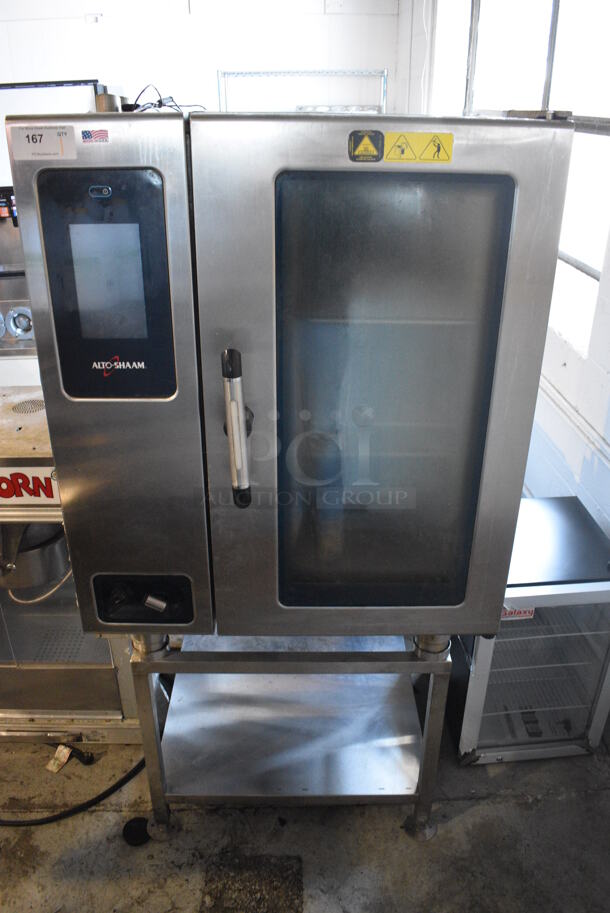 Alto Shaam Stainless Steel Commercial Electric Powered Combitherm Convection Oven on Stainless Steel Equipment Stand. Appears To Be Model CTP10-10E. 35.5x38x71