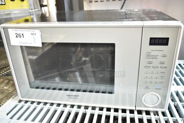 Sharp R-309YV Countertop Microwave Oven w/ Plate. 120 Volts, 1 Phase. - Item #1114297