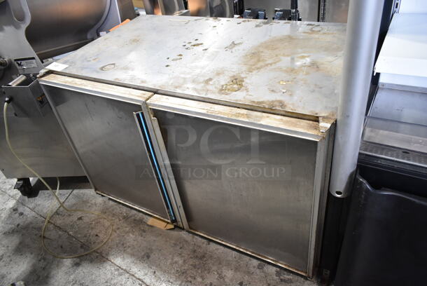 Silver King SKF48 Stainless Steel Commercial 2 Door Undercounter Freezer on Commercial Casters. 115 Volts, 1 Phase. - Item #1112777
