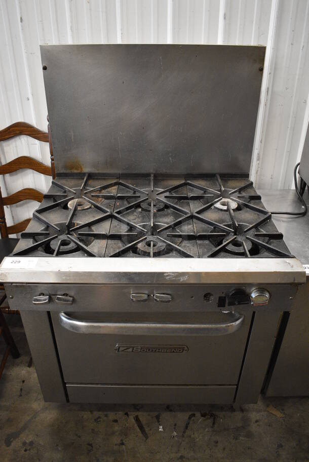 Southbend X336D-F Stainless Steel Commercial Natural Gas Powered 6 Burner Range w/ Oven and Back Splash. 36.5x33x60