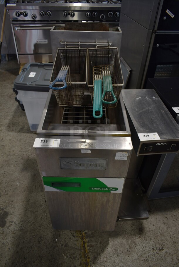 Supera LCF3T-NG Stainless Steel Commercial Floor Style Natural Gas Powered Deep Fat Fryer w/ 2 Metal Fry Baskets on Commercial Casters. 90,000 BTU. - Image 1 of 7