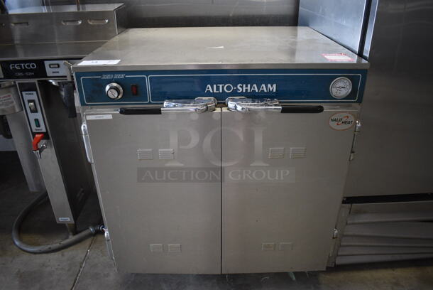 Alto Shaam Model 730-CTUS Halo Heat Stainless Steel Commercial 2 Door Undercounter Heated Holding Cabinet w/ 6 Full Size Baking Pans on Commercial Casters. 30x26x33. Cannot Test Due To Plug Style