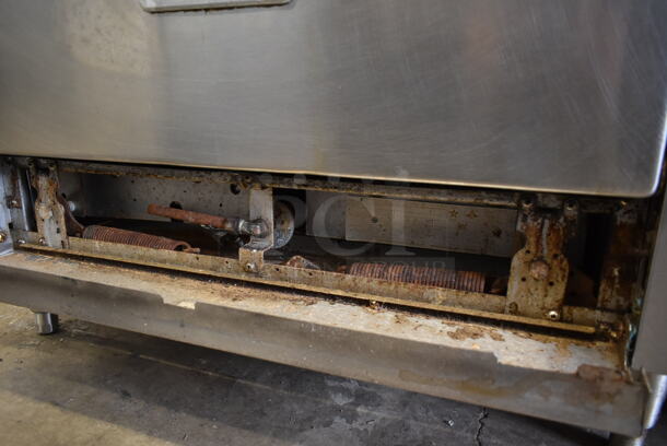 Garland G36-6R Stainless Steel Commercial Natural Gas Powered 6 Burner Range w/ Oven and Back Splash. - Image 8 of 8