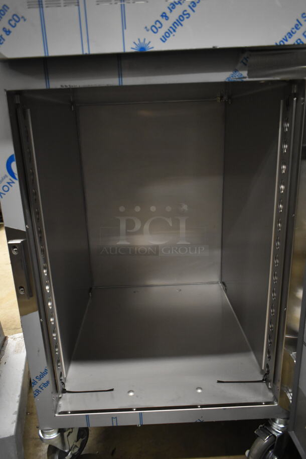 BRAND NEW SCRATCH AND DENT! 2023 Alto Shaam 1200-UP Stainless Steel Commercial Electric Powered Mobile 16 Pan Dutch Door Holding Cabinet with Universal Racks on Commercial Casters. 120 Volts, 1 Phase. Tested and Working! - Image 7 of 10
