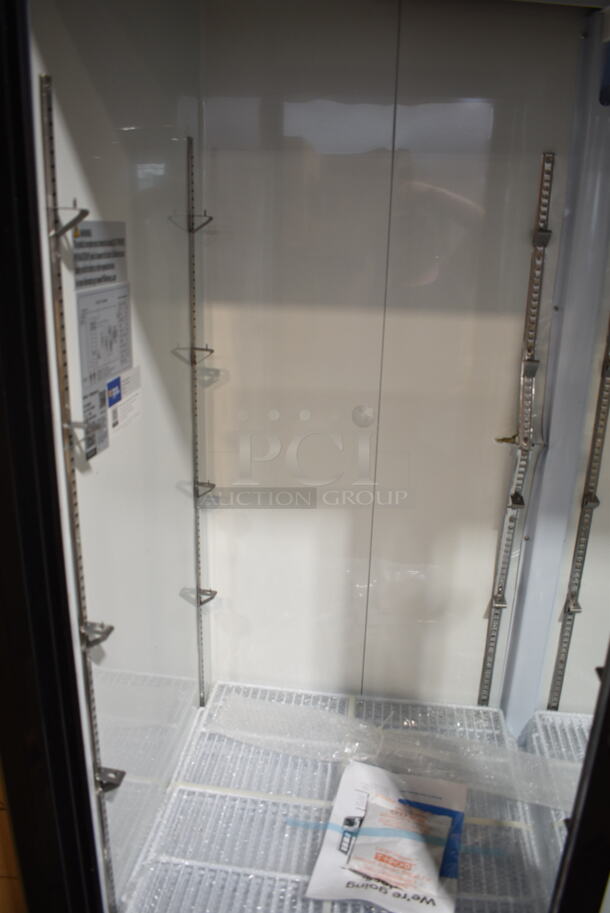 BRAND NEW SCRATCH AND DENT! 2023 Avantco 178GDS47HCB Metal Commercial 2 Door Reach In Cooler Merchandiser w/ Poly Coated Racks on Commercial Casters. 120 Volts, 1 Phase. Tested and Working! - Image 6 of 7