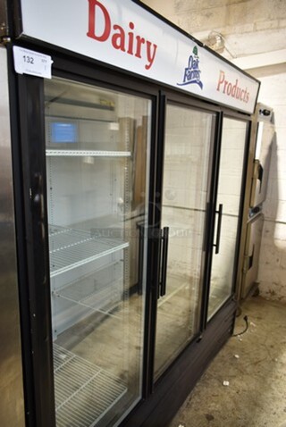 True GDM-72 Metal Commercial 3 Door Reach In Cooler Merchandiser w/ Poly Coated Racks. 115 Volts, 1 Phase. Tested and Powers On But Does Not Get Cold