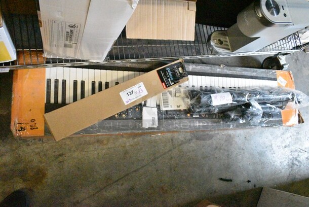 3 Various Items Including Focus 59" Photo/Video Tripod Kit, Studiologic Numa Compact 88 Key Keyboard. 3 Times Your Bid!  - Image 1 of 5