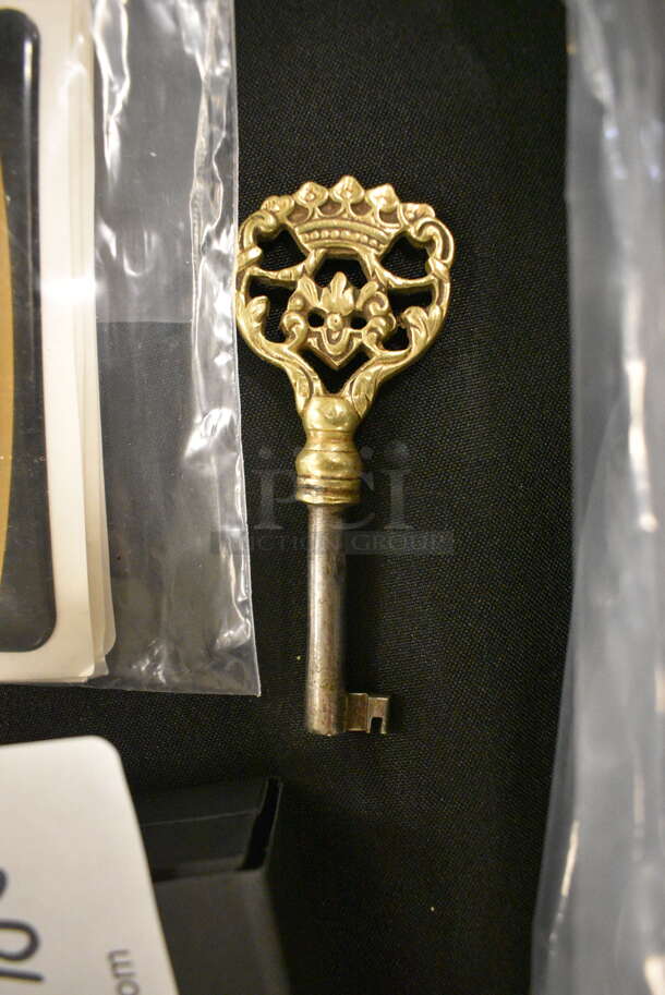 ALL ONE MONEY! Jaguar Stickers, Gold Colored Key, Aston Martin License Plate Holder, and Lamborghini Cuff Links with Box - Image 3 of 6