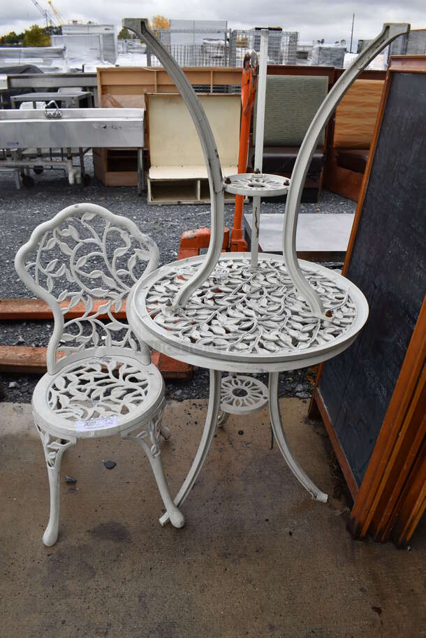 3 White Metal Outdoor Patio Furniture Pieces; 1 Chair and 2 Tables. 16x16x34, 24x24x26. 3 Times Your Bid!