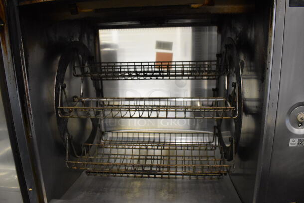 Fri-jado STG7-P Stainless Steel Commercial Electric Powered 5 Spit Rotisserie Oven on Commercial Casters w/ 5 Metal Basket Spits. 208 Volts, 3 Phase. 41x34x71 - Image 8 of 12